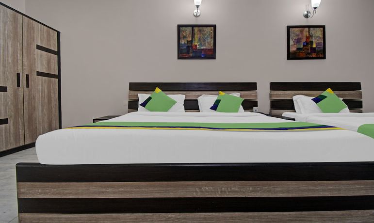 Imagen de la habitación del Hotel Treebo Trend Maharaja Residency. Foto 7