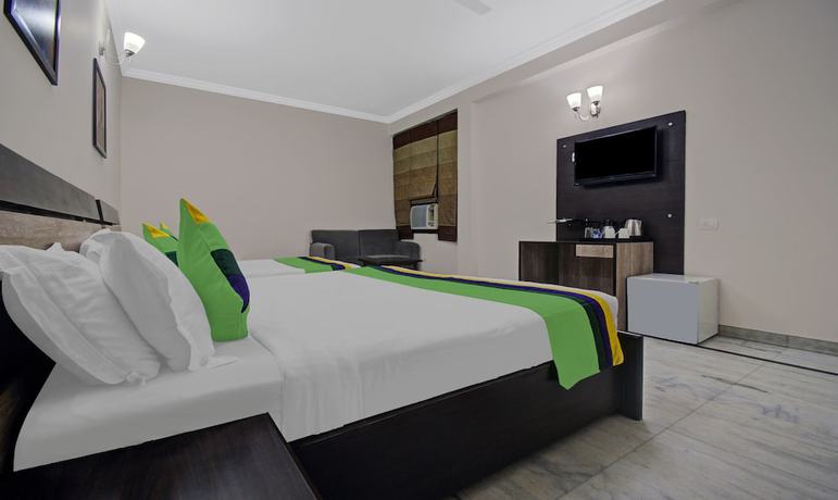 Imagen de la habitación del Hotel Treebo Trend Maharaja Residency. Foto 8