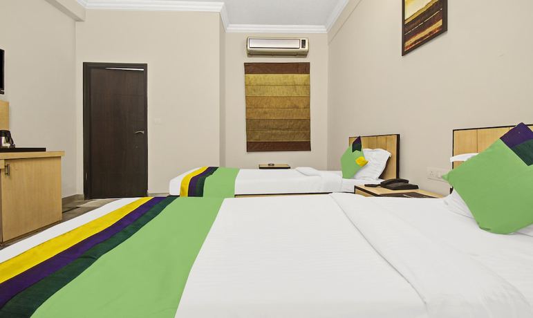 Imagen de la habitación del Hotel Treebo Trend Maharaja Residency. Foto 9