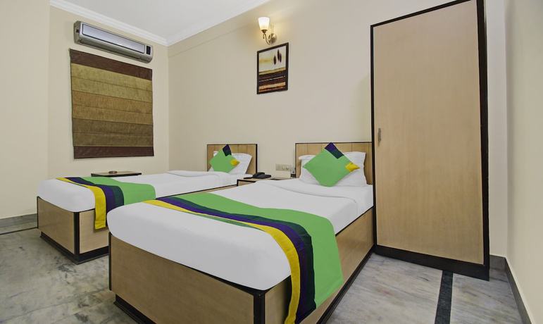 Imagen de la habitación del Hotel Treebo Trend Maharaja Residency. Foto 15