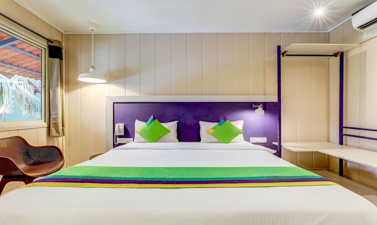 Imagen de la habitación del Hotel Treebo Trend Morjim Banyan Resort. Foto 4