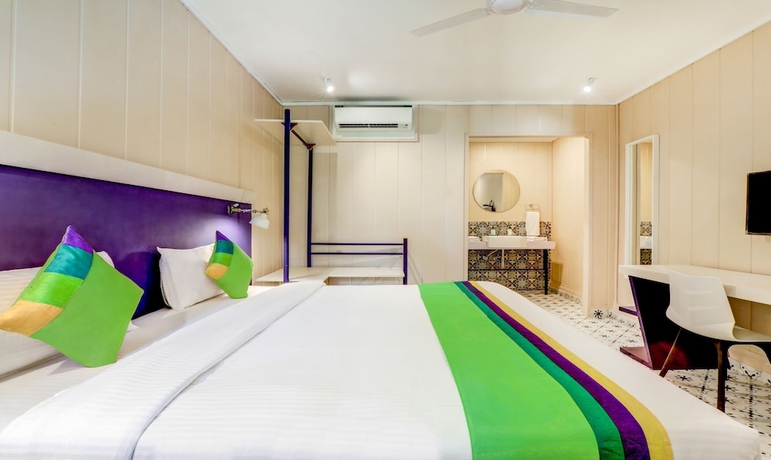 Imagen de la habitación del Hotel Treebo Trend Morjim Banyan Resort. Foto 9