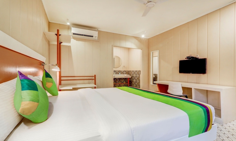 Imagen de la habitación del Hotel Treebo Trend Morjim Banyan Resort. Foto 12