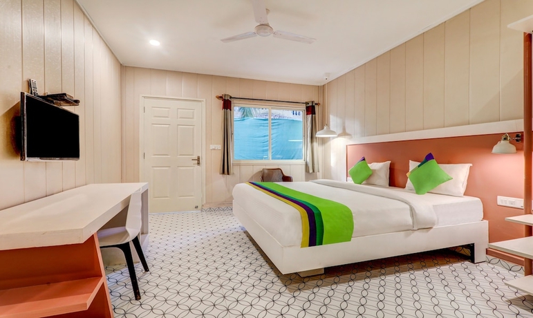 Imagen de la habitación del Hotel Treebo Trend Morjim Banyan Resort. Foto 13