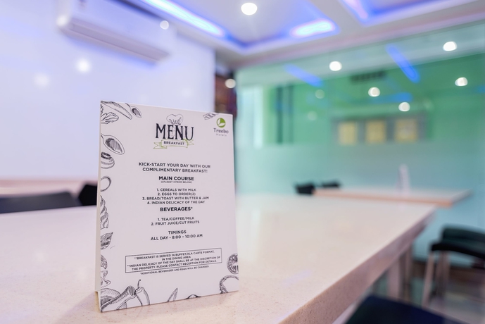 Imagen del bar/restaurante del Hotel Treebo Trend Mvp Grand. Foto 3