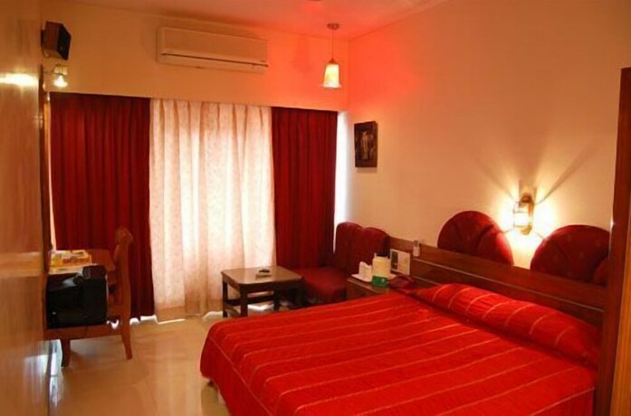 Imagen de la habitación del Hotel Treebo Trend Natraj. Foto 16