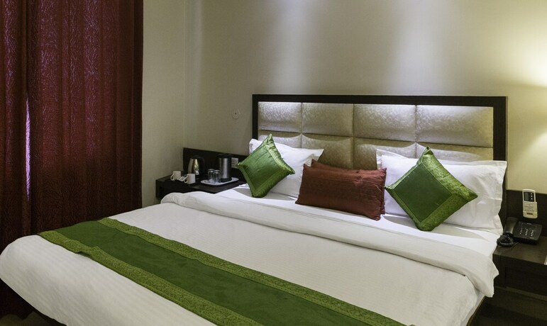 Imagen de la habitación del Hotel Treebo Trend Natraj. Foto 18