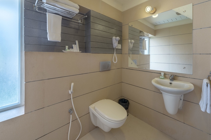 Imagen de la habitación del Hotel Treebo Trend Nestlay Airport. Foto 13