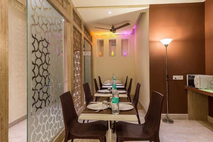 Imagen del bar/restaurante del Hotel Treebo Trend Nestlay Casa. Foto 3
