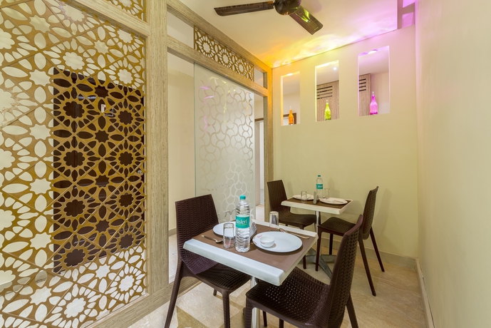 Imagen del bar/restaurante del Hotel Treebo Trend Nestlay Casa. Foto 5