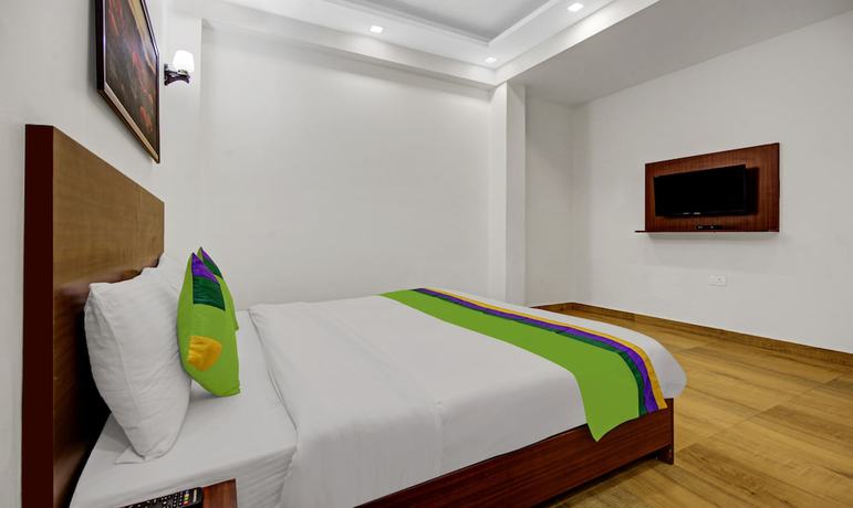 Imagen de la habitación del Hotel Treebo Trend Noida Grand. Foto 10