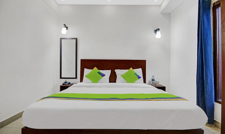 Imagen de la habitación del Hotel Treebo Trend Noida Grand. Foto 16