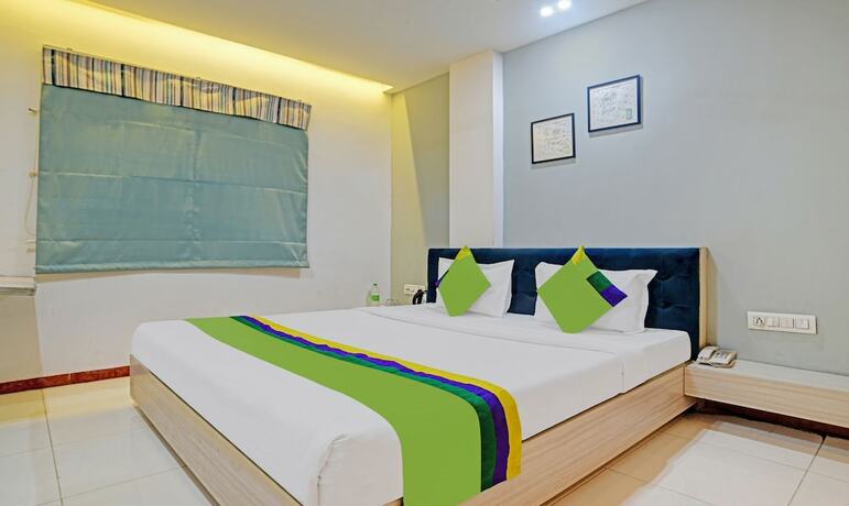 Imagen de la habitación del Hotel Treebo Trend Omkar. Foto 16