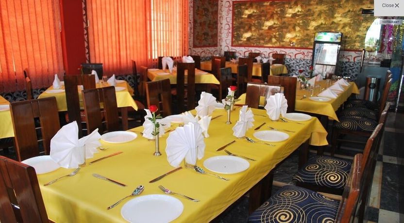 Imagen del bar/restaurante del Hotel Treebo Trend Paradise Inn and Banquet. Foto 6