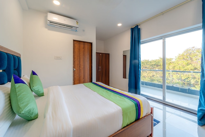 Imagen de la habitación del Hotel Treebo Trend Pure Earth Stay. Foto 2