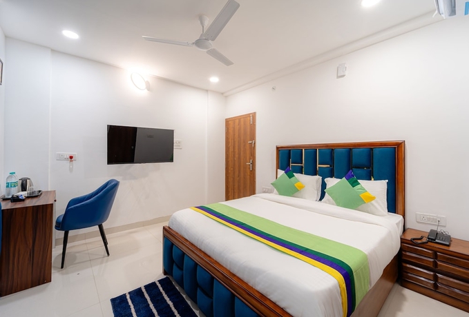 Imagen de la habitación del Hotel Treebo Trend Pure Earth Stay. Foto 7