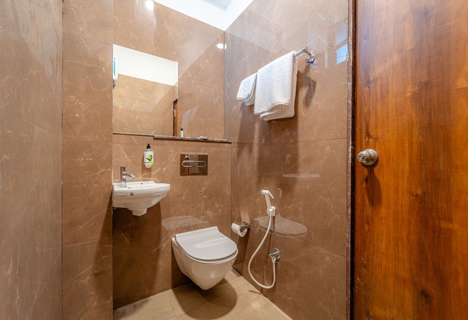 Imagen de la habitación del Hotel Treebo Trend Pure Earth Stay. Foto 10