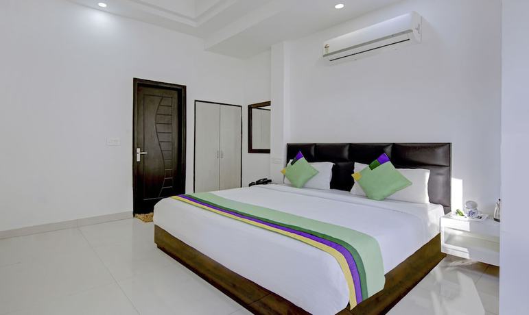 Imagen de la habitación del Hotel Treebo Trend Rockland. Foto 8