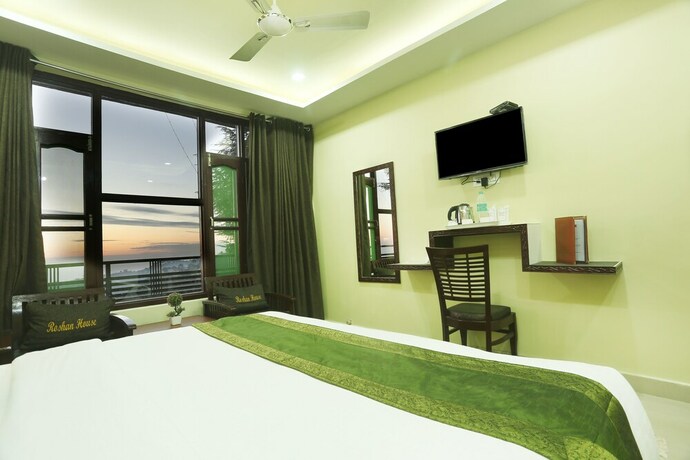 Imagen de la habitación del Hotel Treebo Trend Roshan House. Foto 17