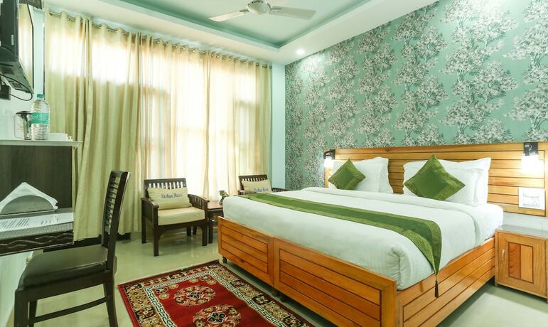 Imagen de la habitación del Hotel Treebo Trend Roshan House. Foto 21