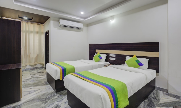 Imagen de la habitación del Hotel Treebo Trend Royal Dizire. Foto 4