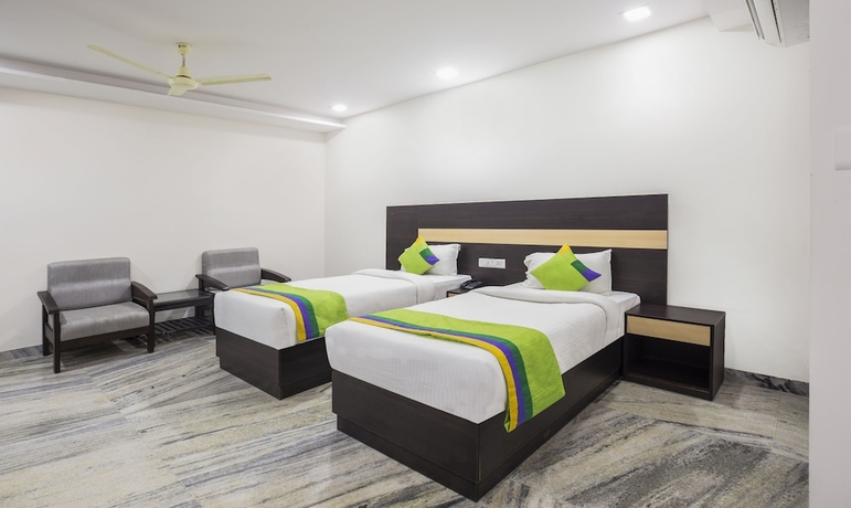 Imagen de la habitación del Hotel Treebo Trend Royal Dizire. Foto 9