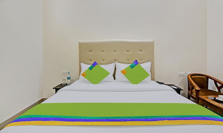 Imagen de la habitación del Hotel Treebo Trend Royal Empire. Foto 9