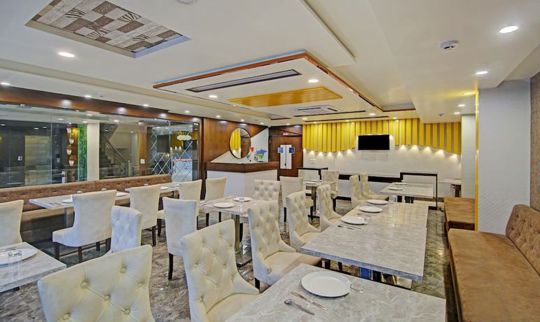 Imagen del bar/restaurante del Hotel Treebo Trend S G Grand. Foto 4
