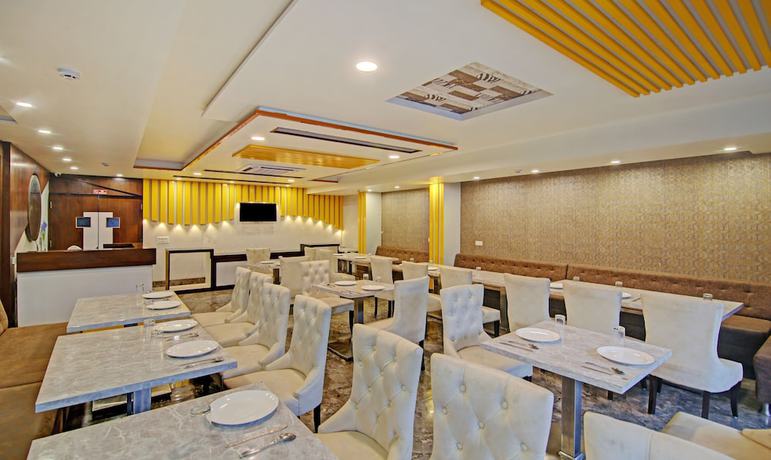 Imagen del bar/restaurante del Hotel Treebo Trend S G Grand. Foto 5