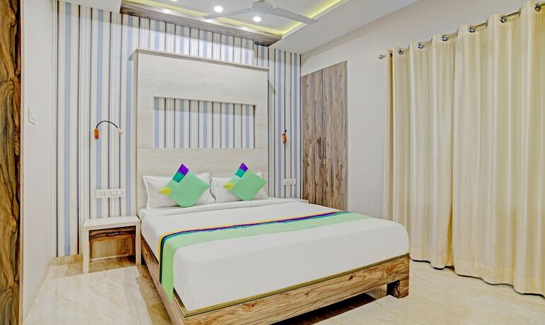 Imagen de la habitación del Hotel Treebo Trend Shiv Chhaya. Foto 19