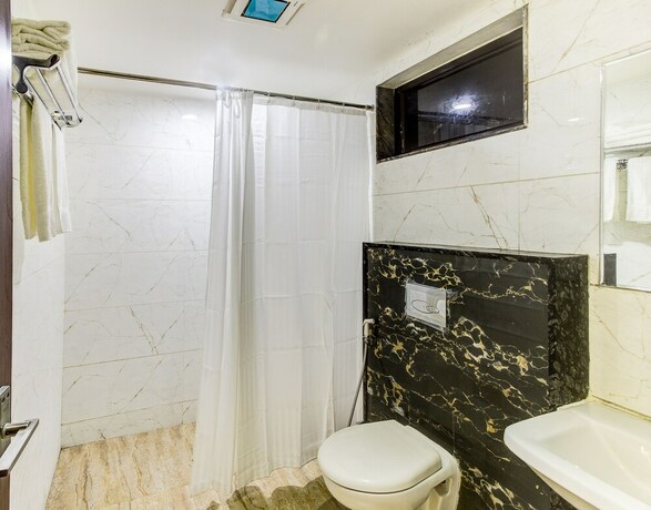 Imagen de la habitación del Hotel Treebo Trend Shivani. Foto 20