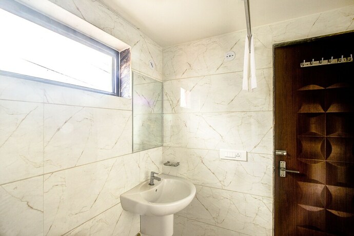 Imagen de la habitación del Hotel Treebo Trend Shivani. Foto 22