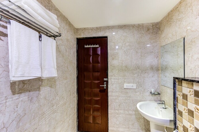 Imagen de la habitación del Hotel Treebo Trend Shivani. Foto 25