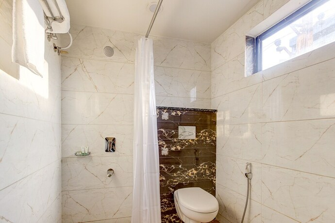 Imagen de la habitación del Hotel Treebo Trend Shivani. Foto 26