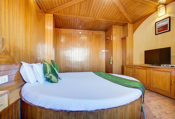 Imagen de la habitación del Hotel Treebo Trend Snow View Resort. Foto 5