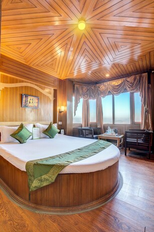 Imagen de la habitación del Hotel Treebo Trend Snow View Resort. Foto 15