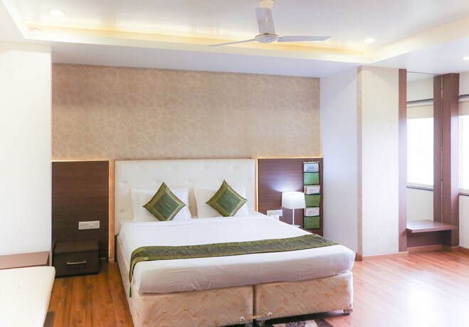 Imagen de la habitación del Hotel Treebo Trend Sun Palace Bhopal. Foto 21