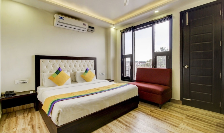 Imagen de la habitación del Hotel Treebo Trend Surya Residency. Foto 11