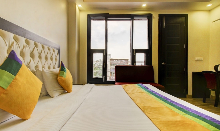 Imagen de la habitación del Hotel Treebo Trend Surya Residency. Foto 14
