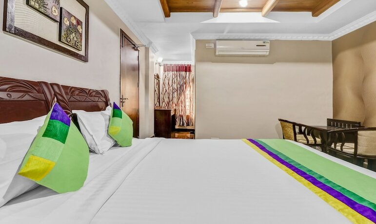 Imagen de la habitación del Hotel Treebo Trend Symphonys And Resorts. Foto 17