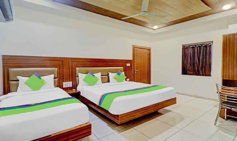 Imagen de la habitación del Hotel Treebo Trend Taj Dream. Foto 3