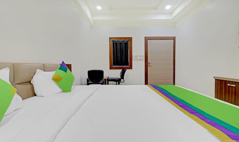 Imagen de la habitación del Hotel Treebo Trend Taj Dream. Foto 11