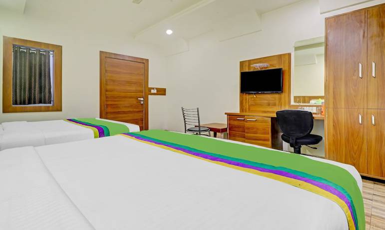 Imagen de la habitación del Hotel Treebo Trend Taj Dream. Foto 12