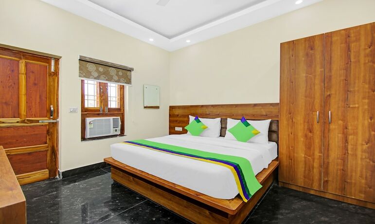 Imagen de la habitación del Hotel Treebo Trend The Eden Roc. Foto 19
