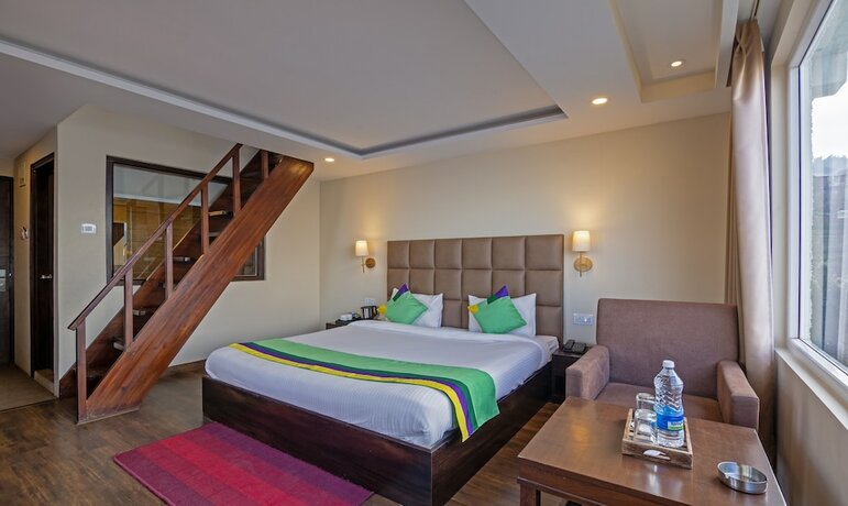 Imagen de la habitación del Hotel Treebo Trend The Northern Retreat Resort. Foto 17
