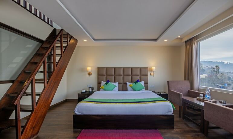 Imagen de la habitación del Hotel Treebo Trend The Northern Retreat Resort. Foto 18