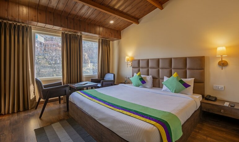 Imagen de la habitación del Hotel Treebo Trend The Northern Retreat Resort. Foto 19