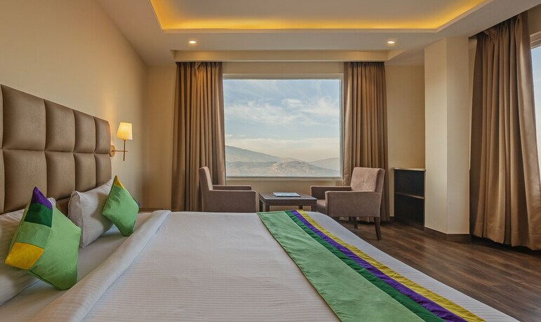 Imagen de la habitación del Hotel Treebo Trend The Northern Retreat Resort. Foto 20