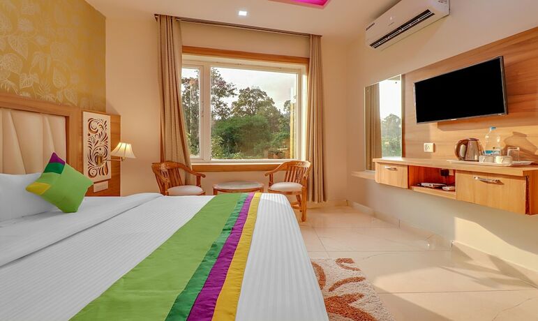 Imagen de la habitación del Hotel Treebo Trend Tropical Roots. Foto 15