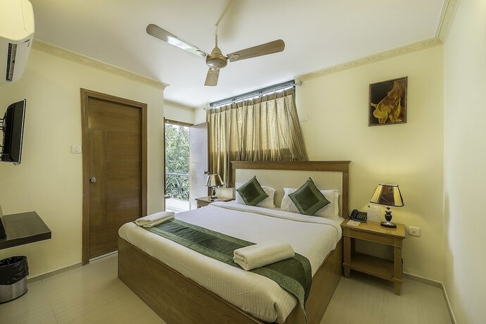 Imagen general del Hotel Treebo Trend Woodsvilla Suites. Foto 1